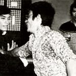 Carter Wong and Bruce Lee exchanging martial arts tips